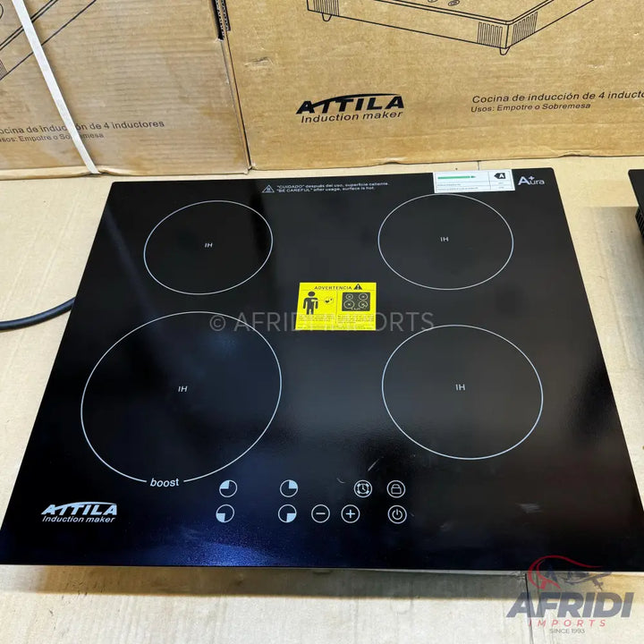 Black four-burner induction cooktop.
