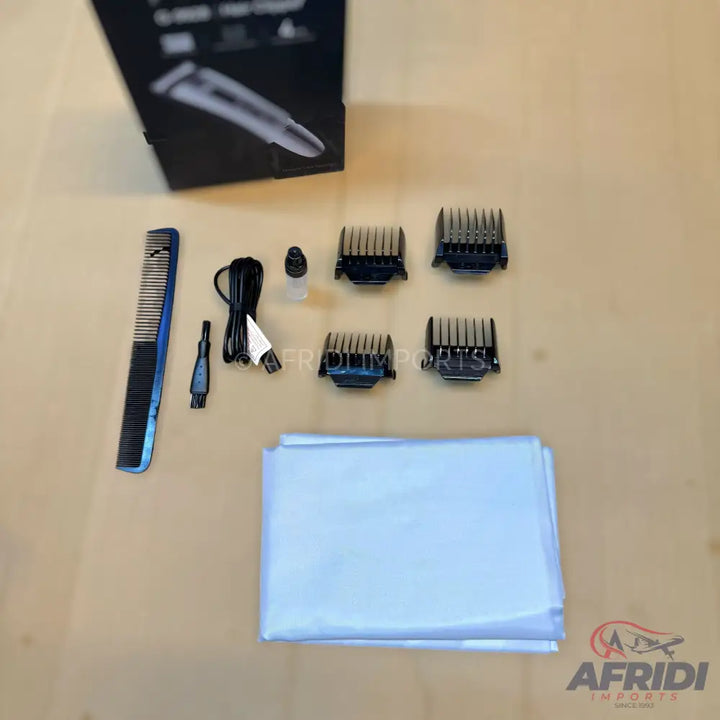 Hair clipper kit with multiple attachments and accessories.