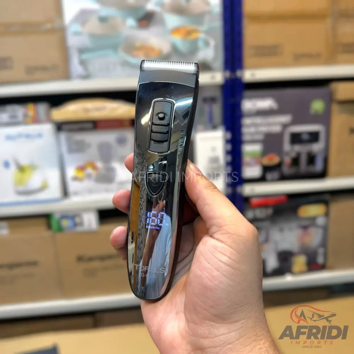 A sleek, dark gray electric hair trimmer with a digital display showing ’160’’ and a prominent ’FLASH SALE SPECIAL OFFER’ tag.