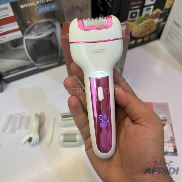 White and pink electric epilator with a digital display.