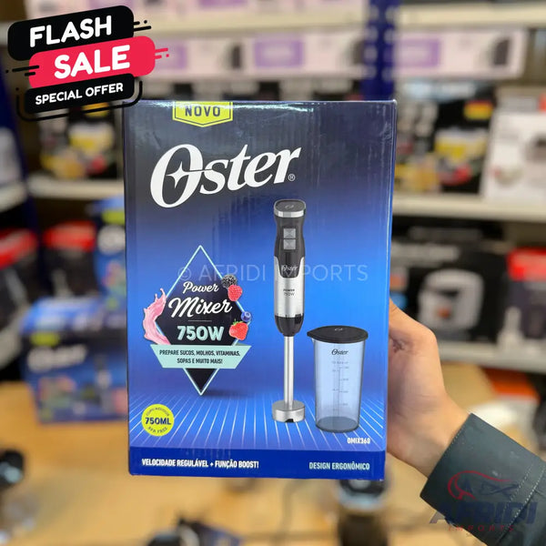 Oster Power Mixer 750W immersion blender with a measuring cup.