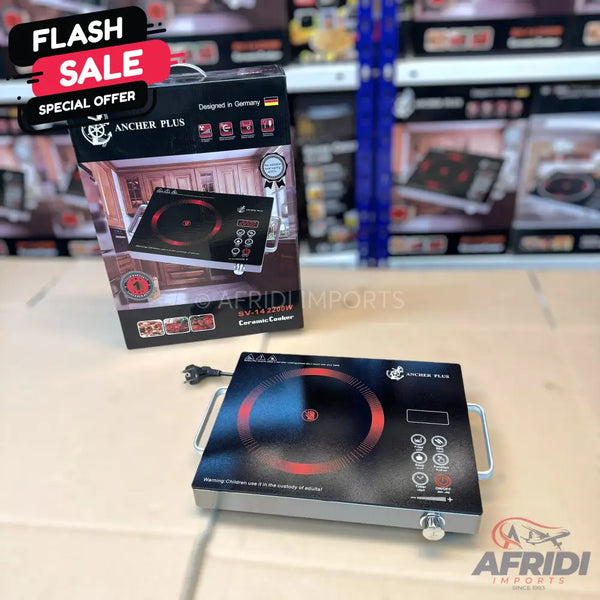 Black ceramic cooker with a single heating zone and control panel.