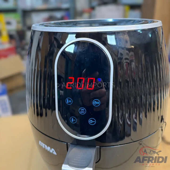 Black digital air fryer with a ribbed texture and a pull-out basket.
