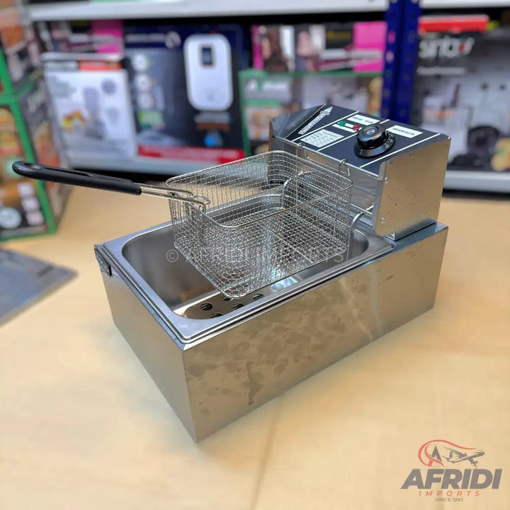 Stainless steel commercial deep fryer with a single basket.