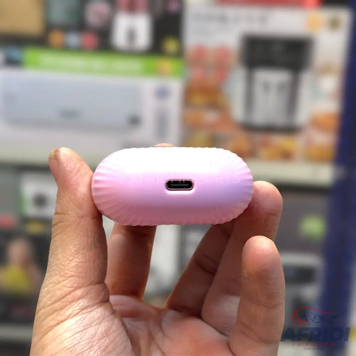 Pink, oval-shaped earbud case with a USB-C charging port.