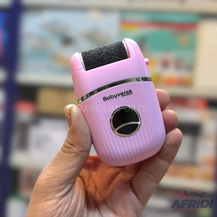 Pink electric foot file with a rotating abrasive roller.