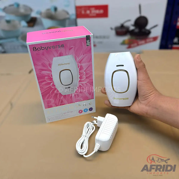 White and gold handheld IPL hair removal device with its pink-boxed packaging and power adapter.
