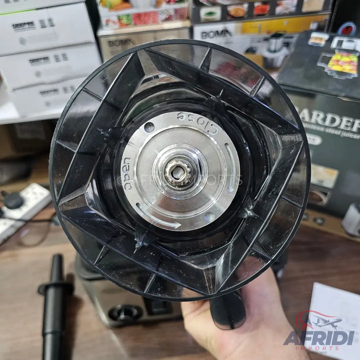 A blender base with a detachable blade assembly.