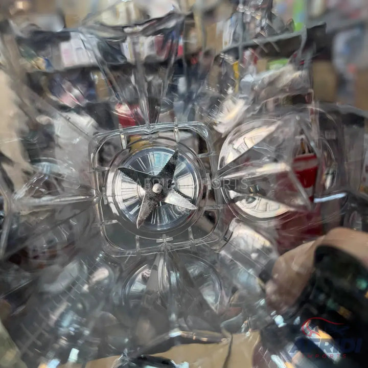 A clear plastic water bottle with a star-shaped base.