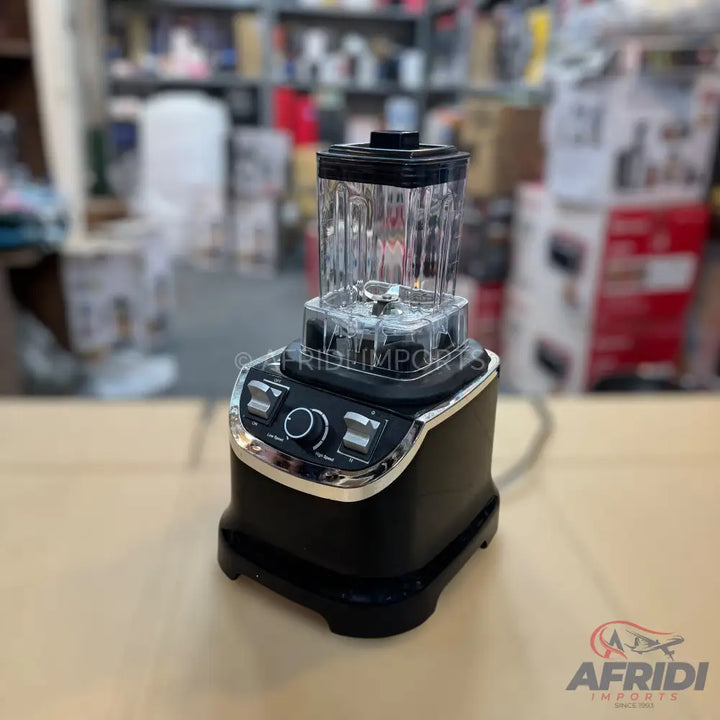 Black and silver blender with a clear pitcher and blade assembly.