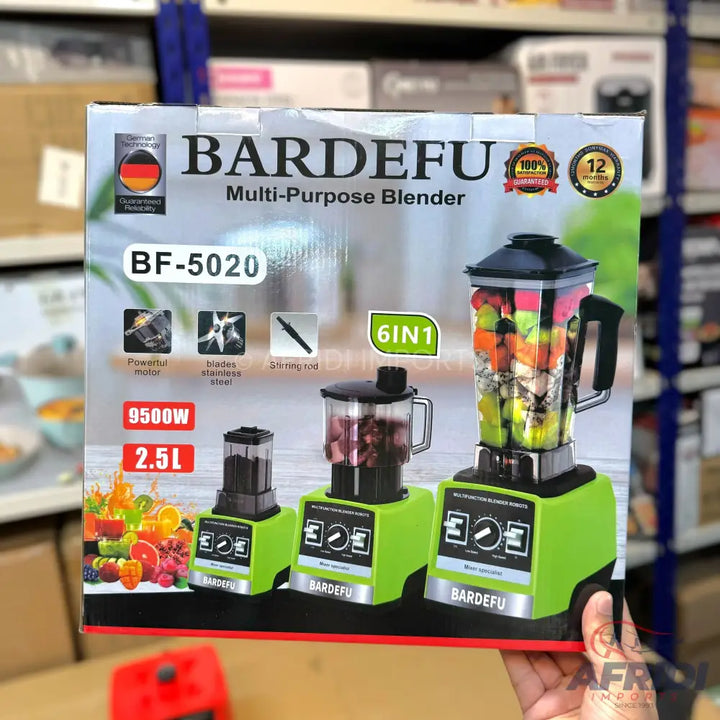 A green, multi-purpose blender with three different attachments for various blending needs.