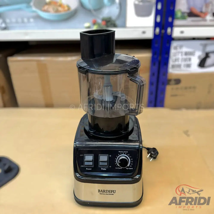 Black and silver food processor with a clear bowl and multiple speed settings.