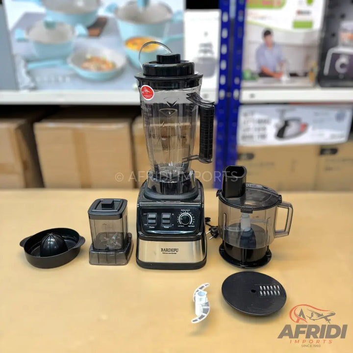 A multi-functional food processor with a blender, food chopper, and citrus juicer attachments.