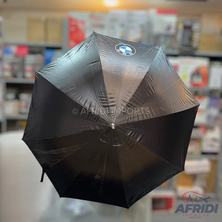 Black umbrella with a BMW logo