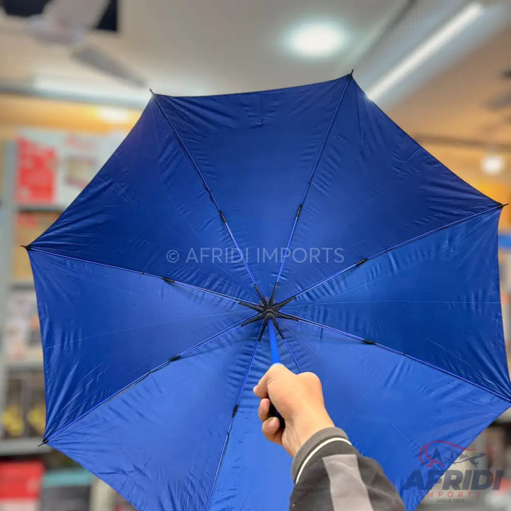 A blue umbrella held open by a hand, featuring a ’Flash Sale Special Offer’ badge.