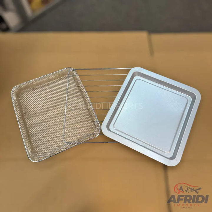 Air fryer accessories including a mesh basket, baking pan, and wire rack.