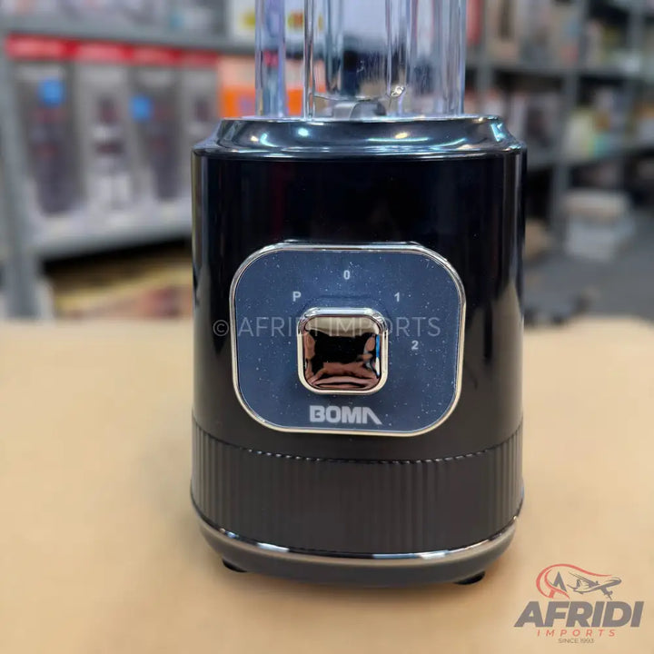 A black, countertop blender with a clear plastic jar, a dial with settings 0, 1, 2, and P, and a silver base.