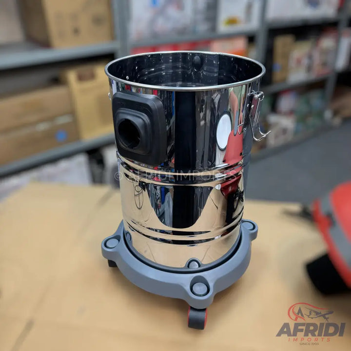 Shiny metallic wet/dry vacuum cleaner with a grey wheeled base.