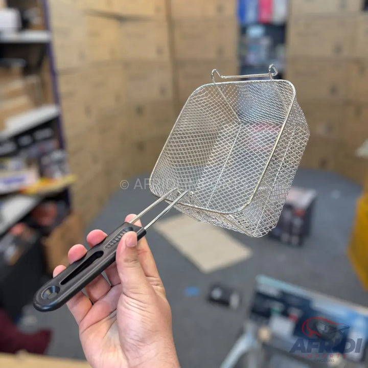 Stainless steel mesh deep fryer basket with a black handle.