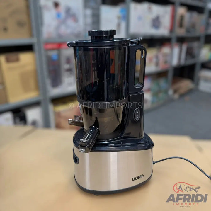 Black and silver slow juicer with a wide feed chute.