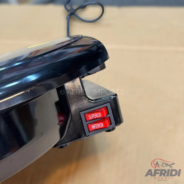 Black electric laminator with two red switches labeled ’SUPERIOR’ and ’INFERIOR.’