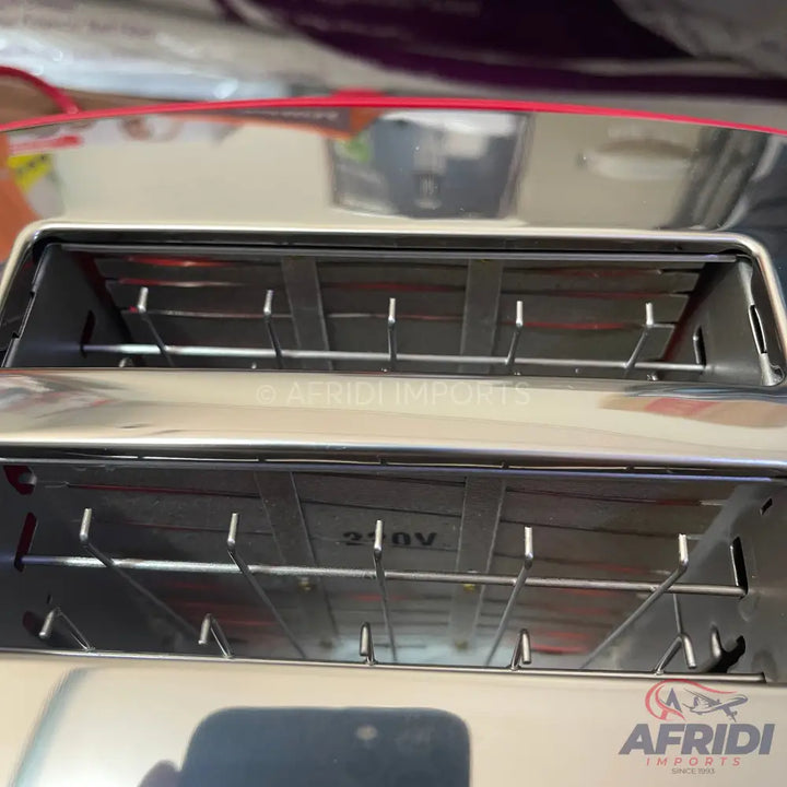 A two-slot stainless steel toaster with red heating elements.