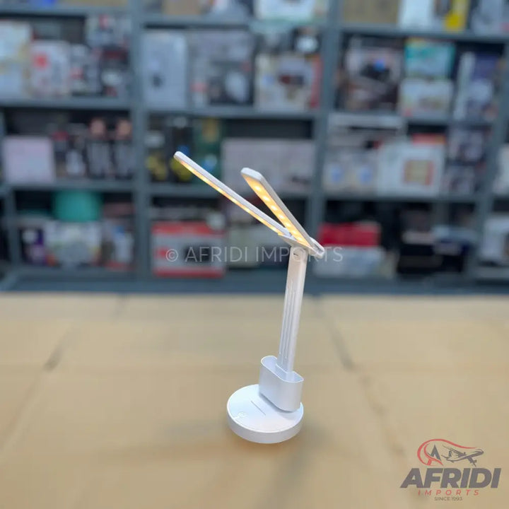 White LED desk lamp with dual adjustable light bars.