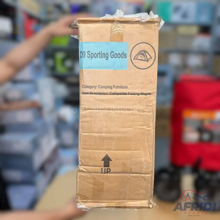 A brown cardboard box for a collapsible folding wagon
