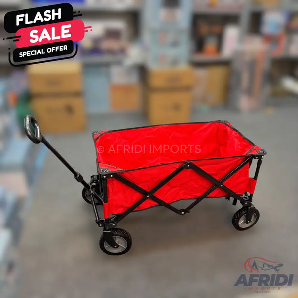 Red collapsible utility wagon with a black frame and handle.