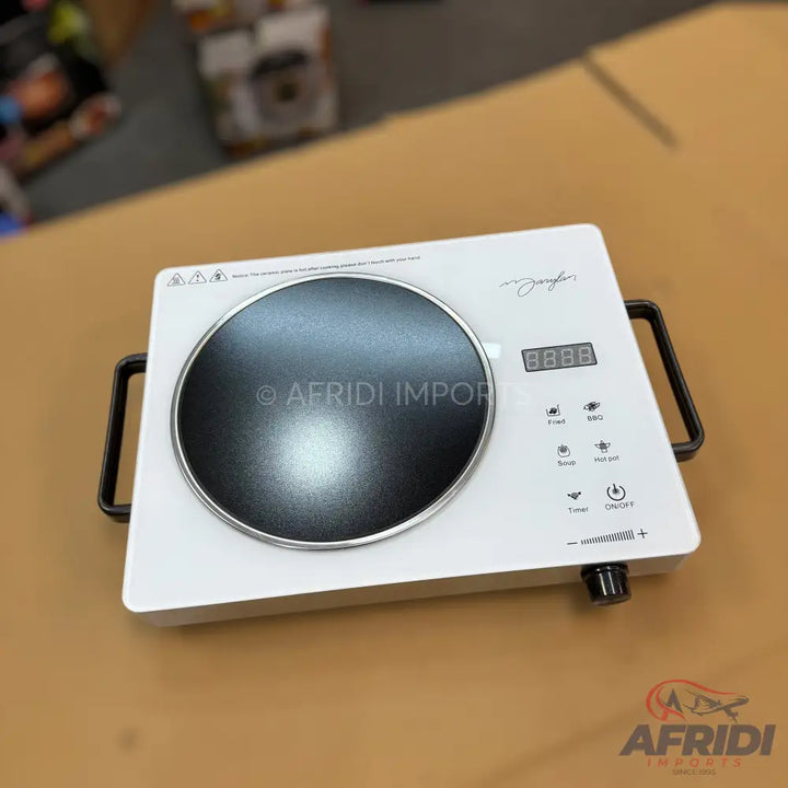 White portable induction cooktop with a single burner and digital controls.