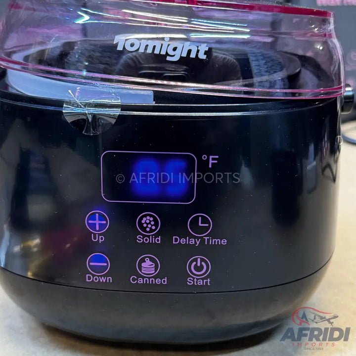Black electric food warmer with digital display and control buttons.