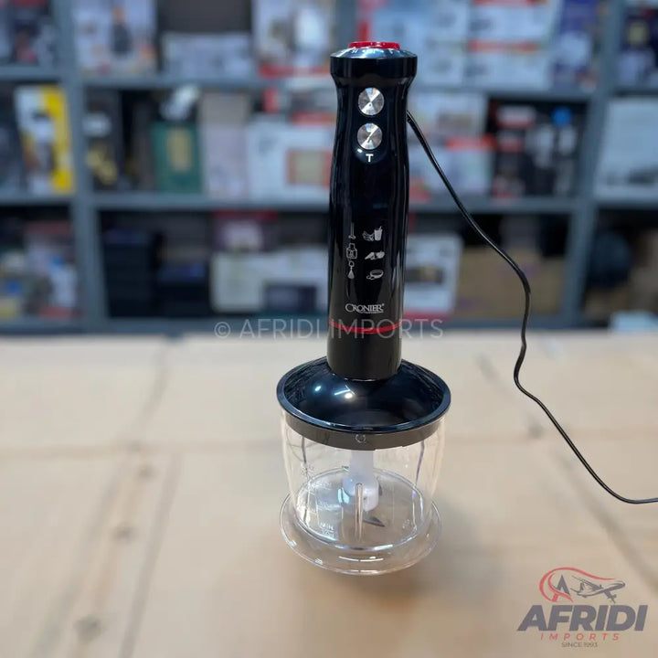 A black immersion blender with a clear chopping attachment.