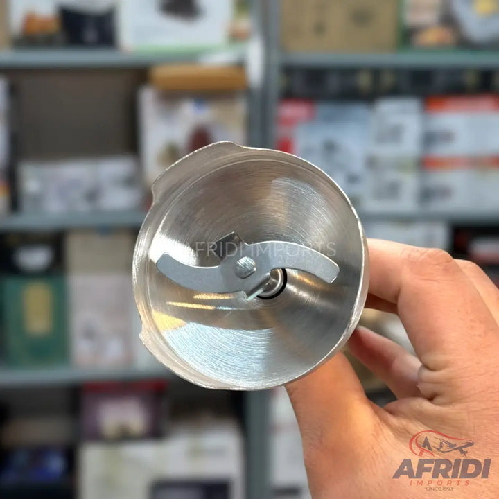 Stainless steel immersion blender head with a two-pronged blade.