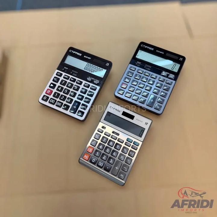 Three black and silver electronic calculators with digital displays and various function buttons.