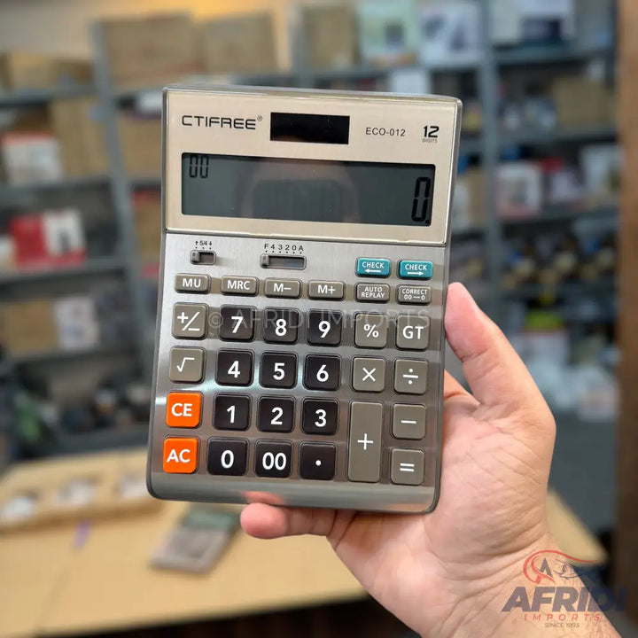 Handheld calculator with silver casing and a large digital display.
