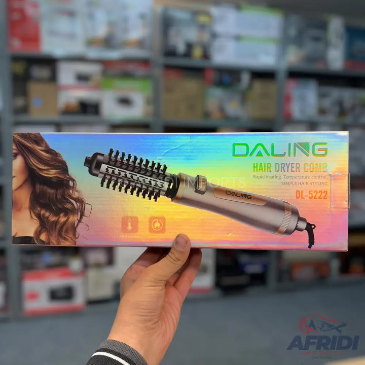 A hair dryer brush with a metallic body and a bristled round barrel.