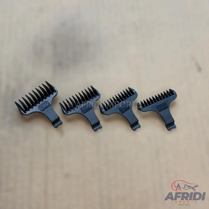 Four black plastic clipper guards with different tooth lengths