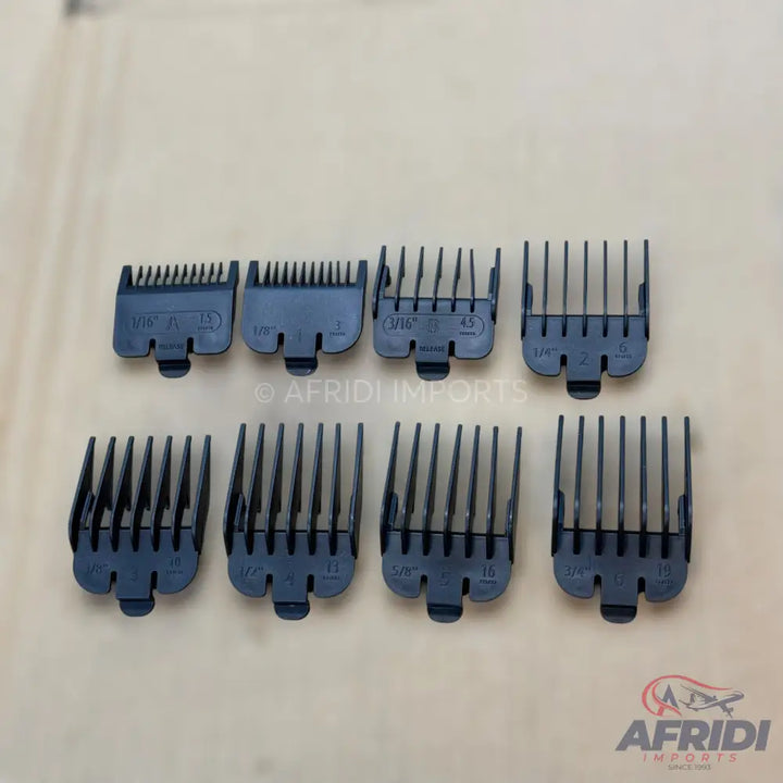 A set of eight dark grey hair clipper guide combs.