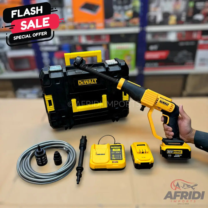 A portable DeWalt pressure washer kit with a case, sprayer, hose, and two batteries.