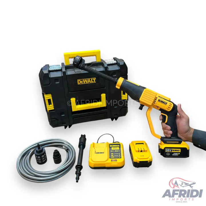 A DeWalt portable pressure washer kit with a carrying case, hose, two batteries, and a charger.