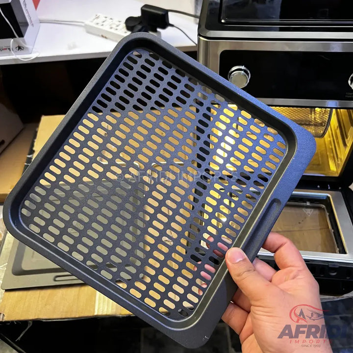 Black perforated air fryer basket.