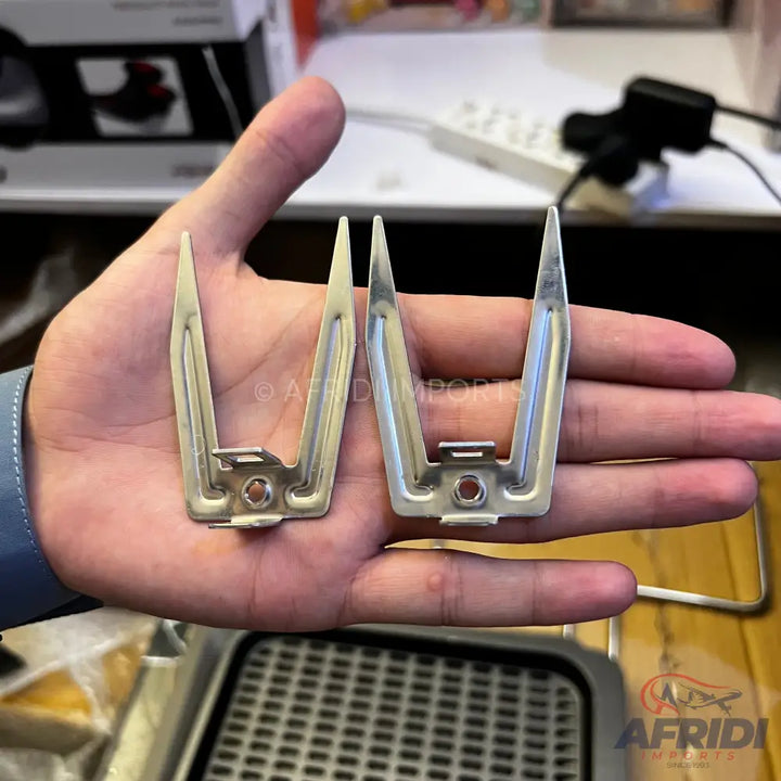 Two metal rotisserie forks for an air fryer.