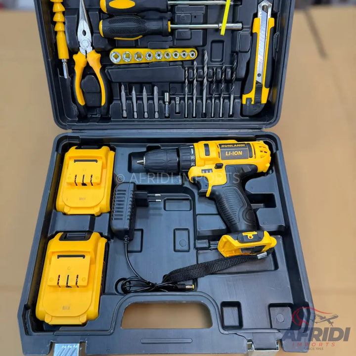 A black and yellow cordless drill and tool set in a hard case.