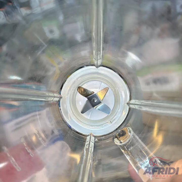 A blender with a four-blade assembly.