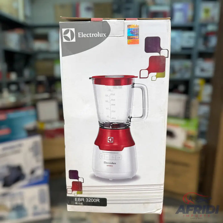 Electrolux blender with a red base and clear glass pitcher.