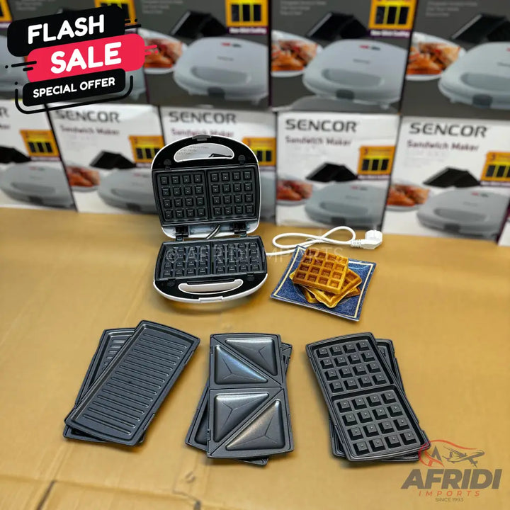 A 3-in-1 sandwich, waffle, and grill maker with interchangeable plates.
