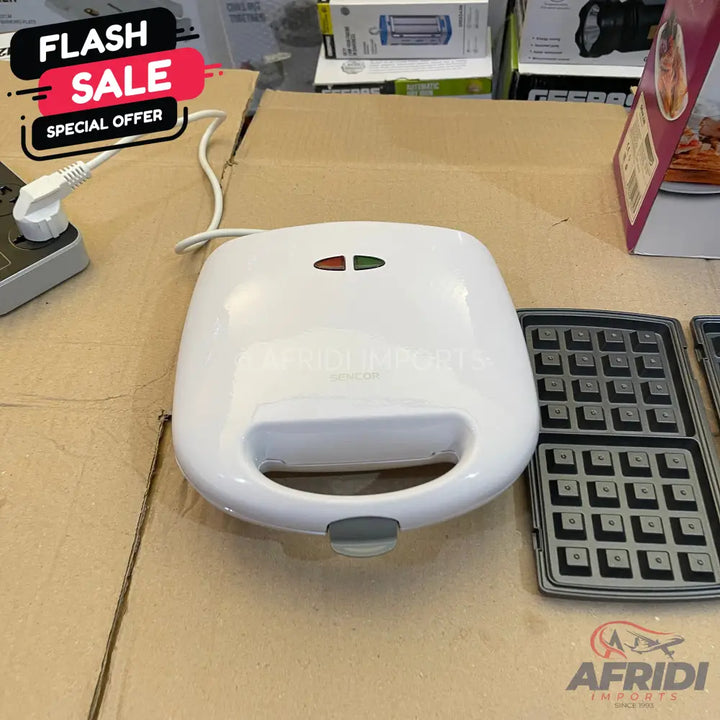 White waffle maker with removable cooking plates.