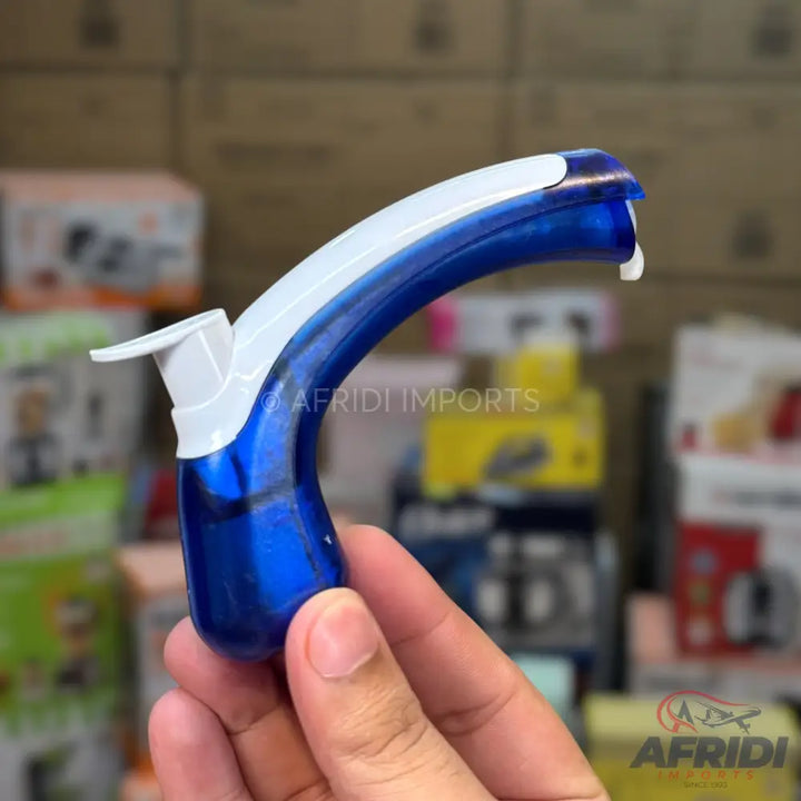 Blue and white handheld fruit peeler with a curved handle.