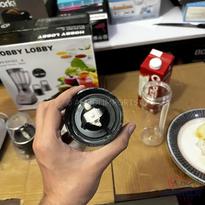 A blender blade assembly with two sharp blades.