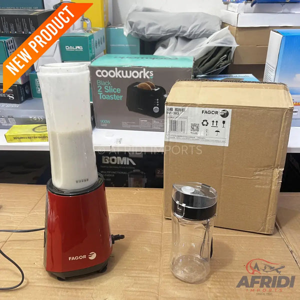 A red personal blender with a clear blending cup, along with an empty, clear spice grinder.